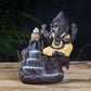4 colori di "Bruciatore di incenso con divinità indiana della saggezza Ganesha"