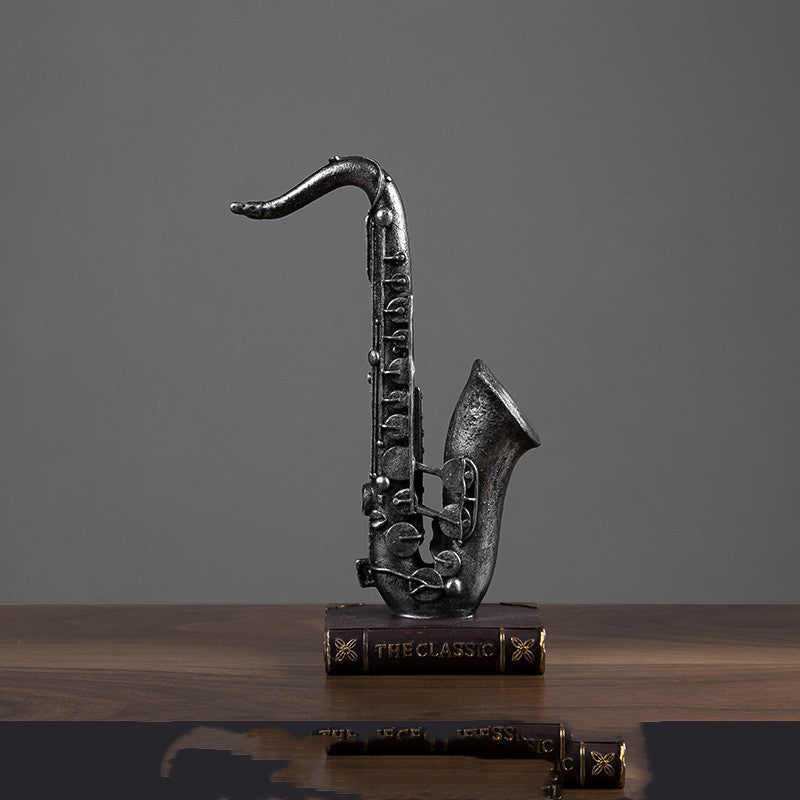 2 modelli di "Statua con strumenti musicali"